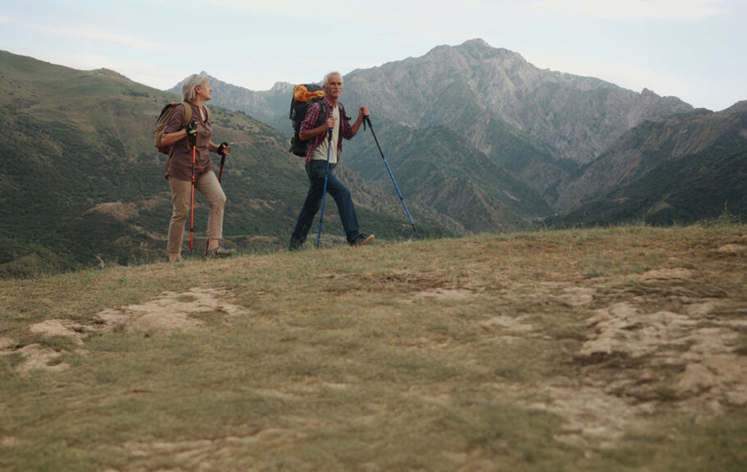 A couple walking and planning their retirement 